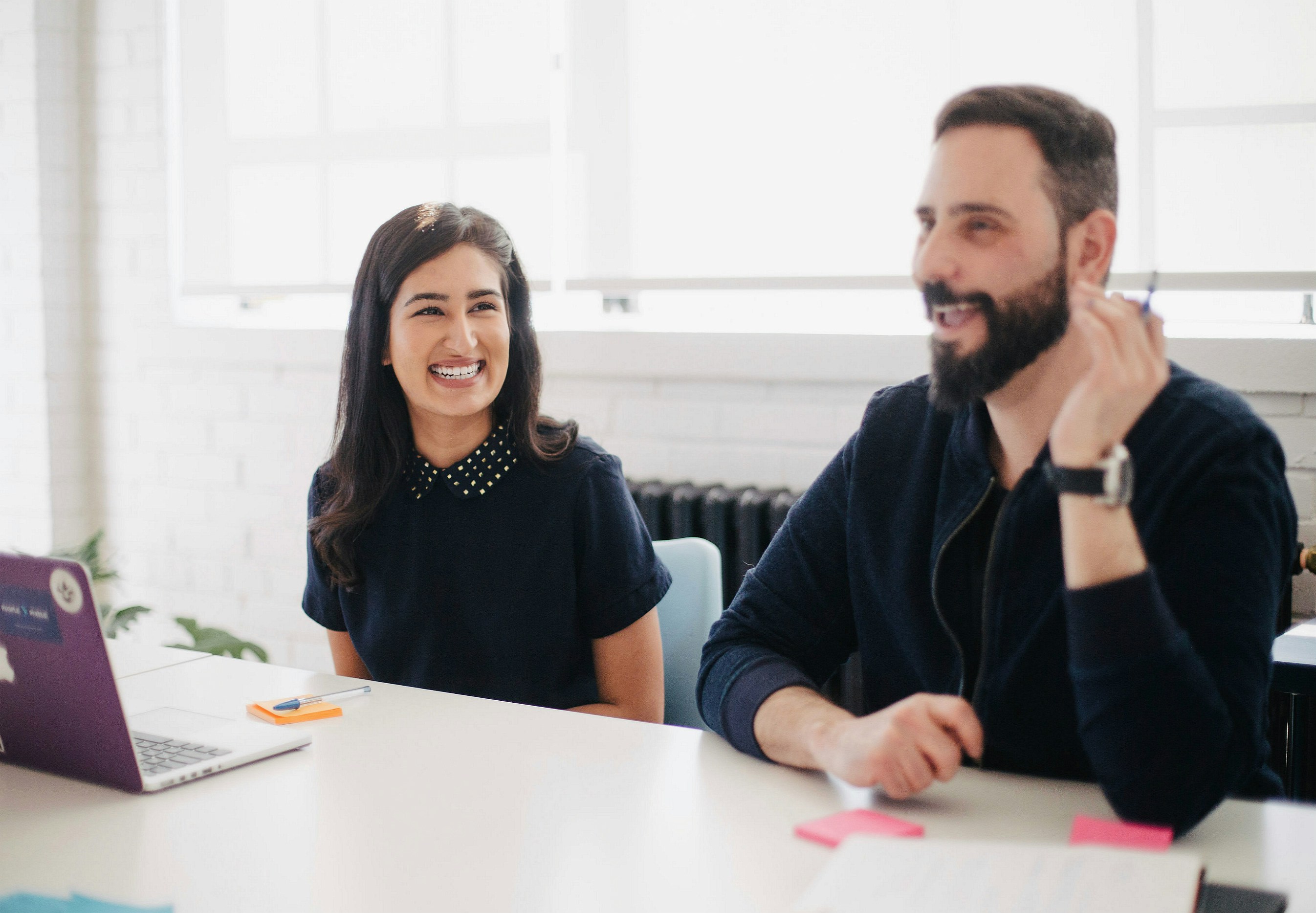 Professional consultants working together on AI strategy